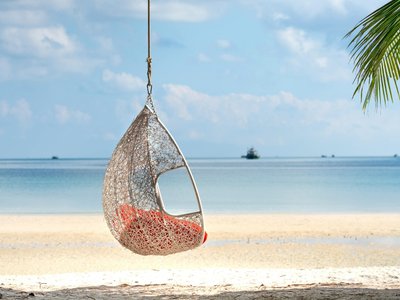 Strand mit Hängestuhl - Belize Highlights