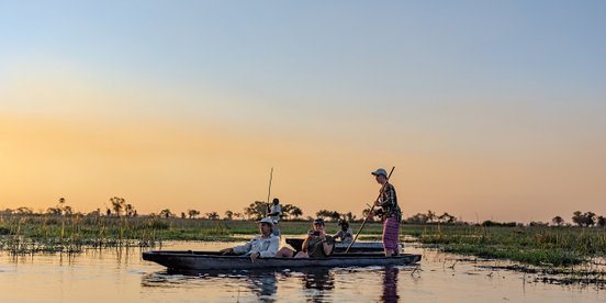 Bootssafari im Sonnenuntergang - Botswana Gruppenreise