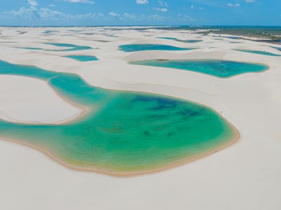 türkisblaues Wasser in weißem Dünenmeer - Brasilien Highlightd