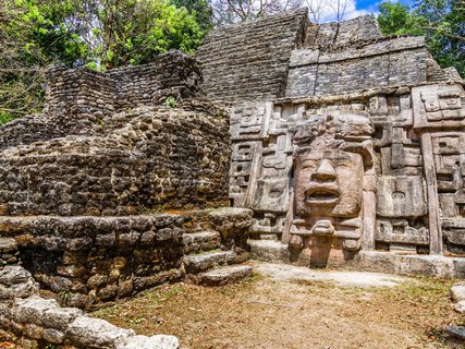 ??????????????????????????????????????????????????????????????????????????????????????????????????????????????????????????????????????????????????????????????????????? Old ancient stone Mayan pre-columbian civilization pyramid with carved face and ornamen