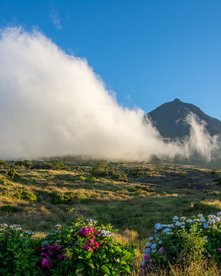Wolken vor dem Vulkan Pico im Abendlicht
