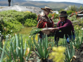 Eine Ecuadorianerin und ein Touristen-Mädchen ernten Gemüse aus dem hoteleigenen Garten